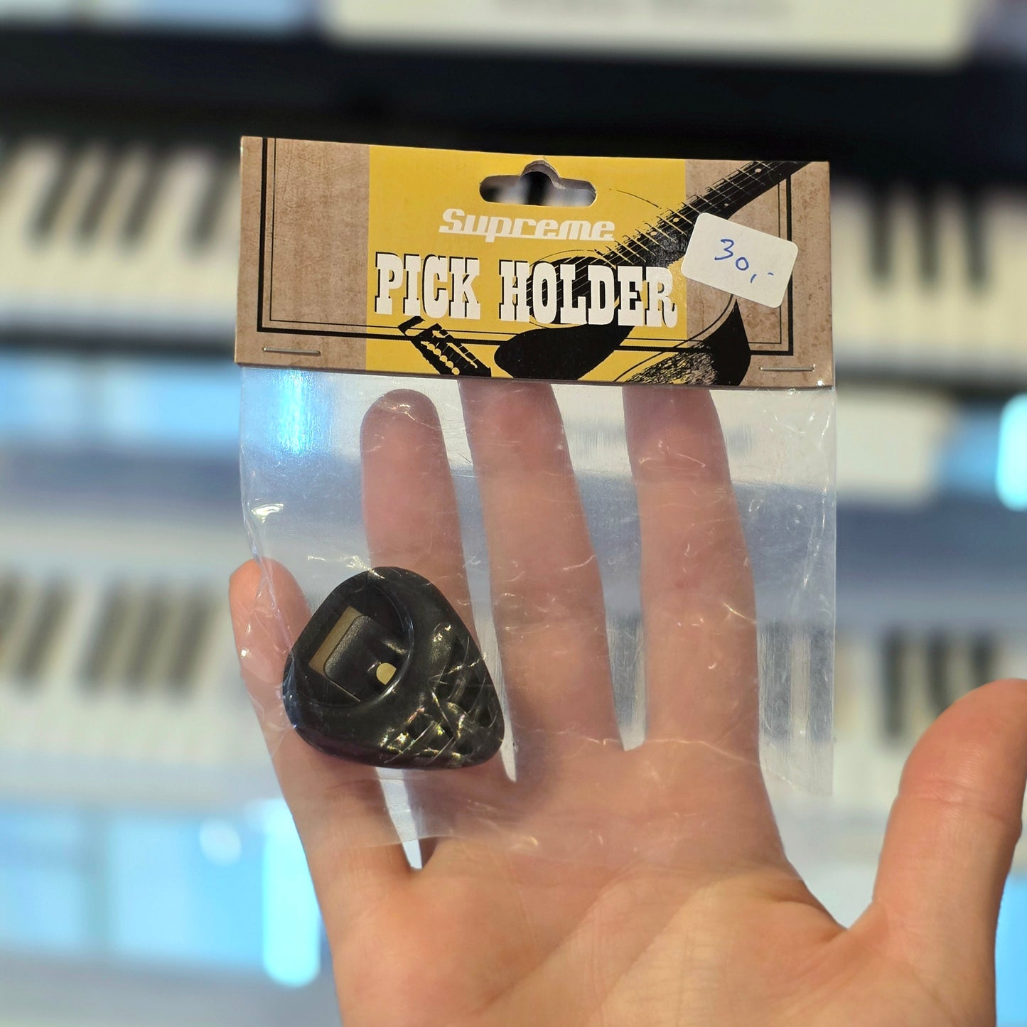 Supreme pick holder plekterholder